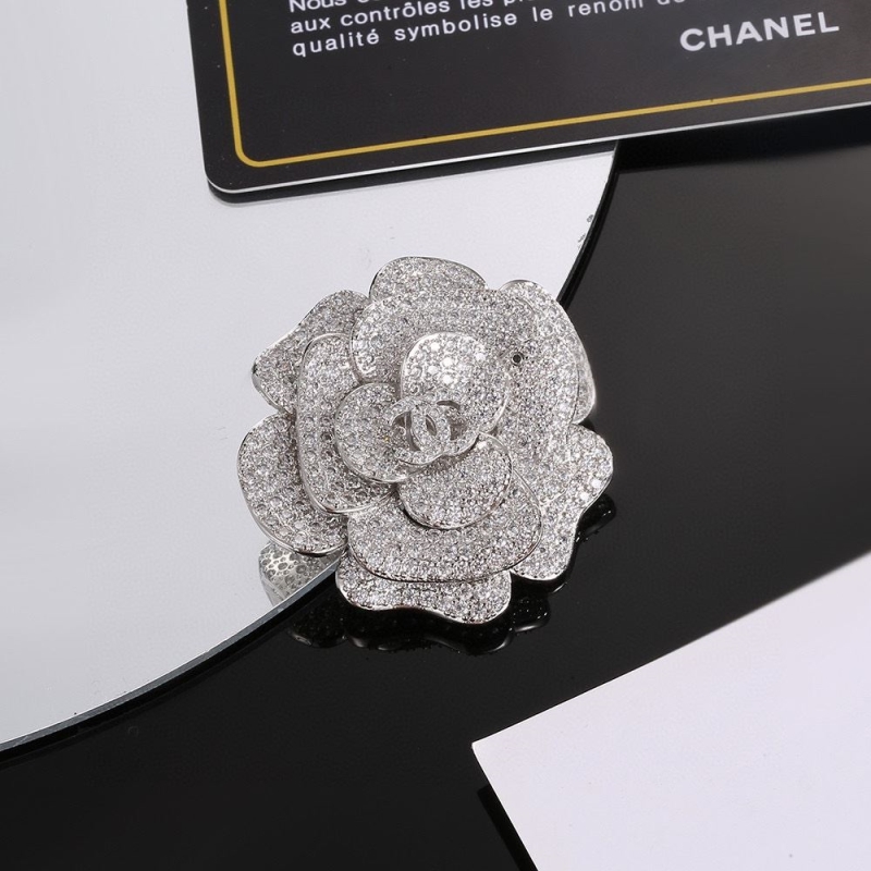 Ch*el brooches
